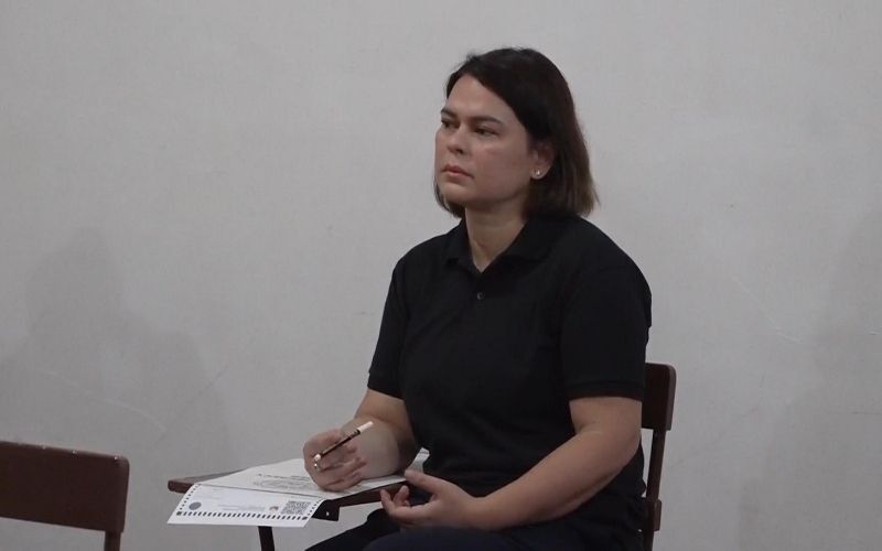 Black-clad Sara Duterte casts vote in midterm elections